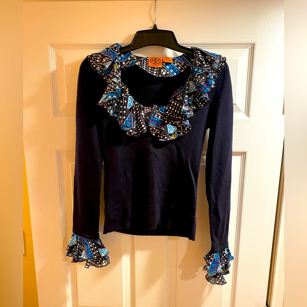 Excellent condition.  Tory Burch wool and silk sweater.